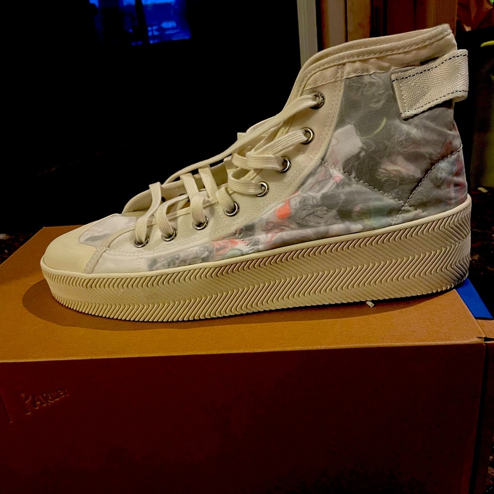 One of a kind Nizza Parley Adidas high tops! Made from recycled materials